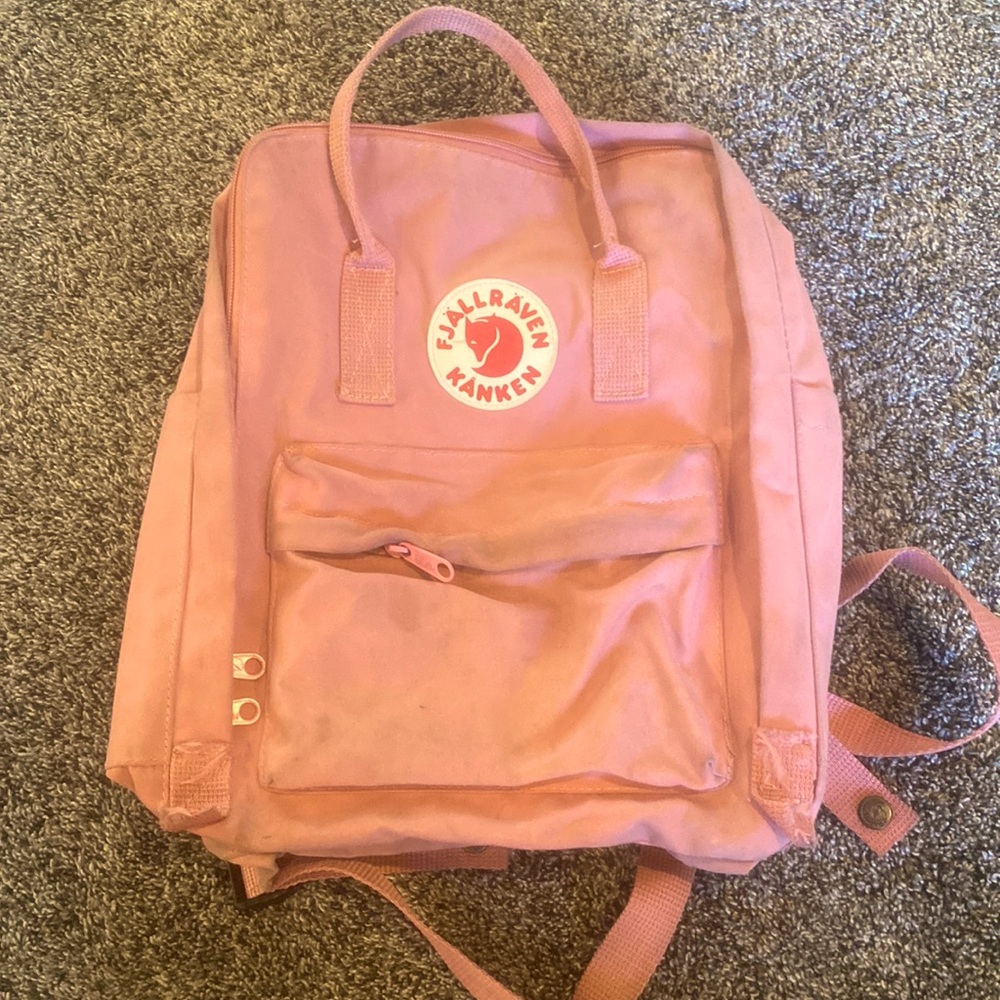 pink full size Fjall Raven Kanken backpack